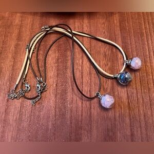 Hand filled glass globe pendants with assorted crystal chips. Set of 3.